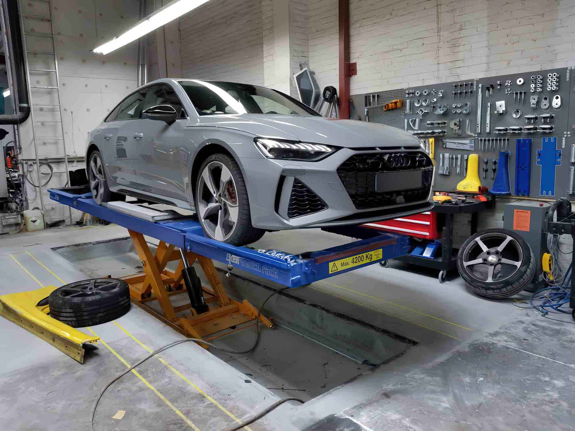 International Sport Motors San Francisco Audi Repair and Service-8 audi service repair on lift
